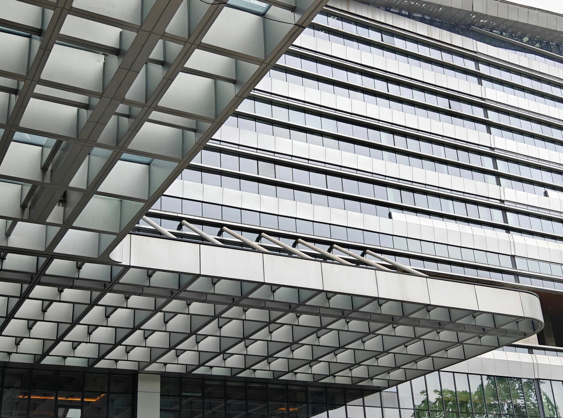 Glass and metal roof structure of a modern building