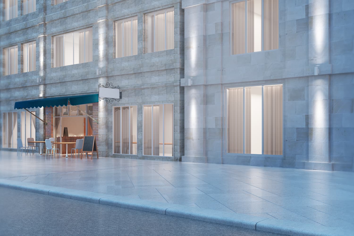 Street-level view of an office building with a ground-floor cafe