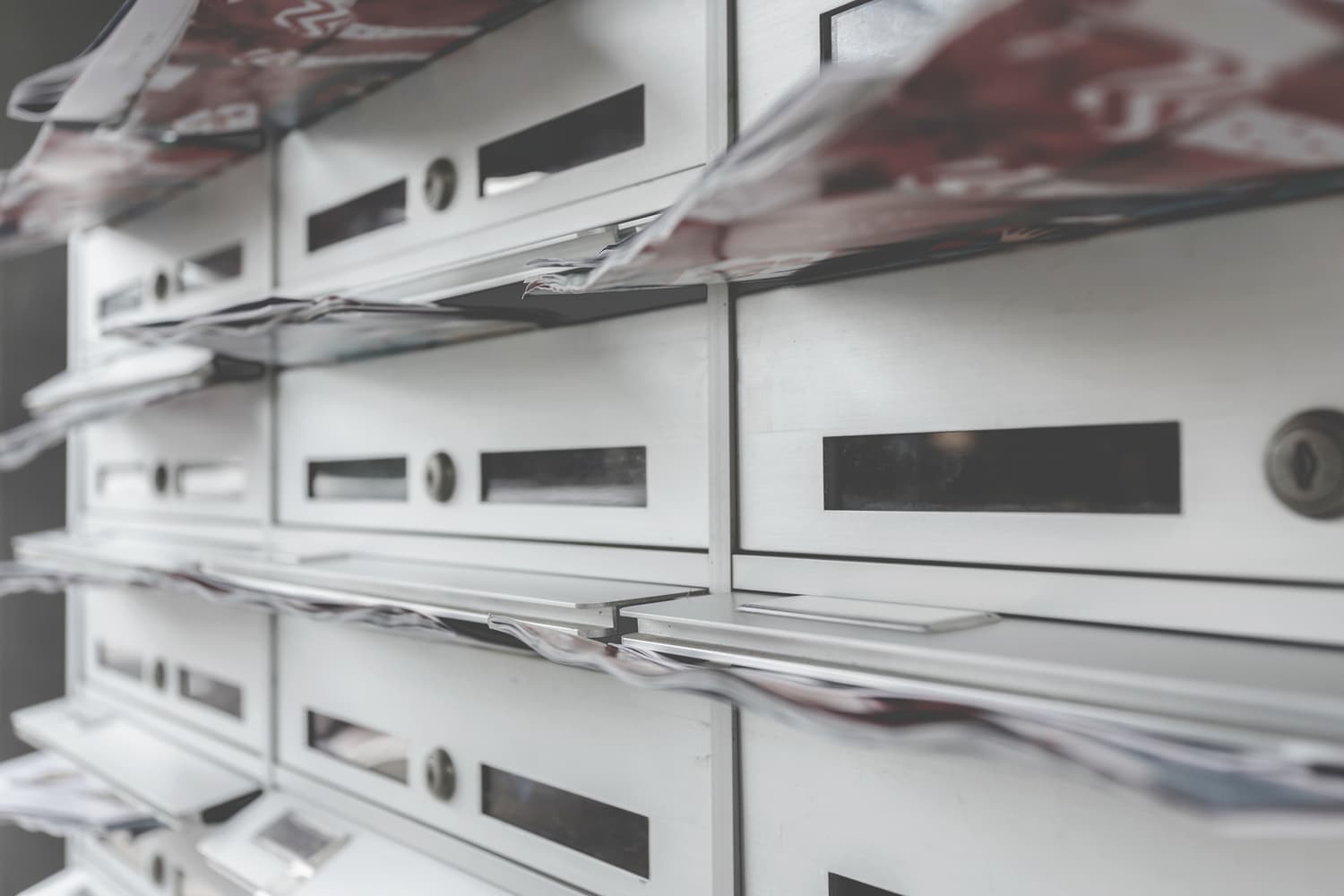 Rows of filled pigeonhole mailboxes