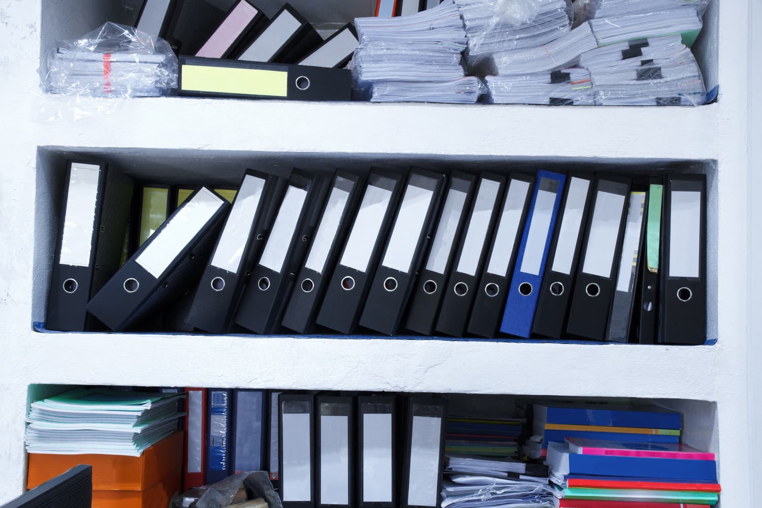 Row of metal filing cabinets in an office